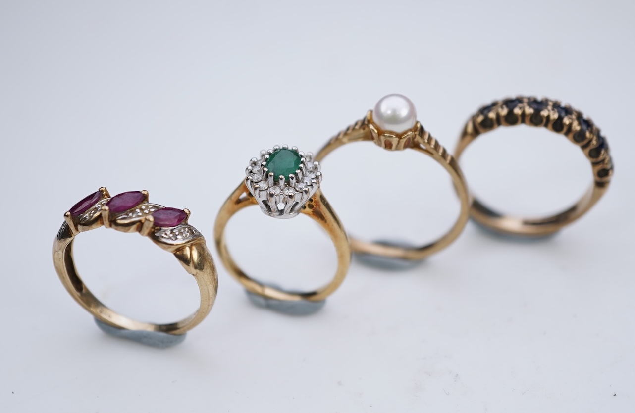 Four gem-set rings